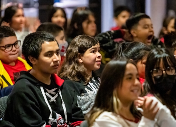 Photo of smiling student faces at Gift of Jazz's Jazz for the Schools program in Denver, CO