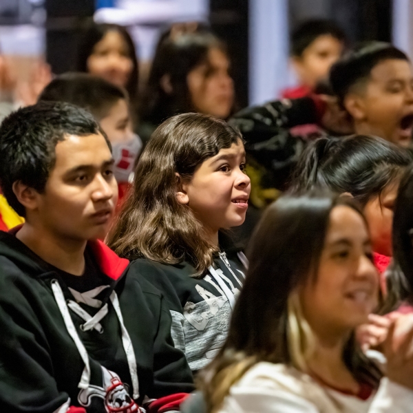 Photo of smiling student faces at Gift of Jazz's Jazz for the Schools program in Denver, CO
