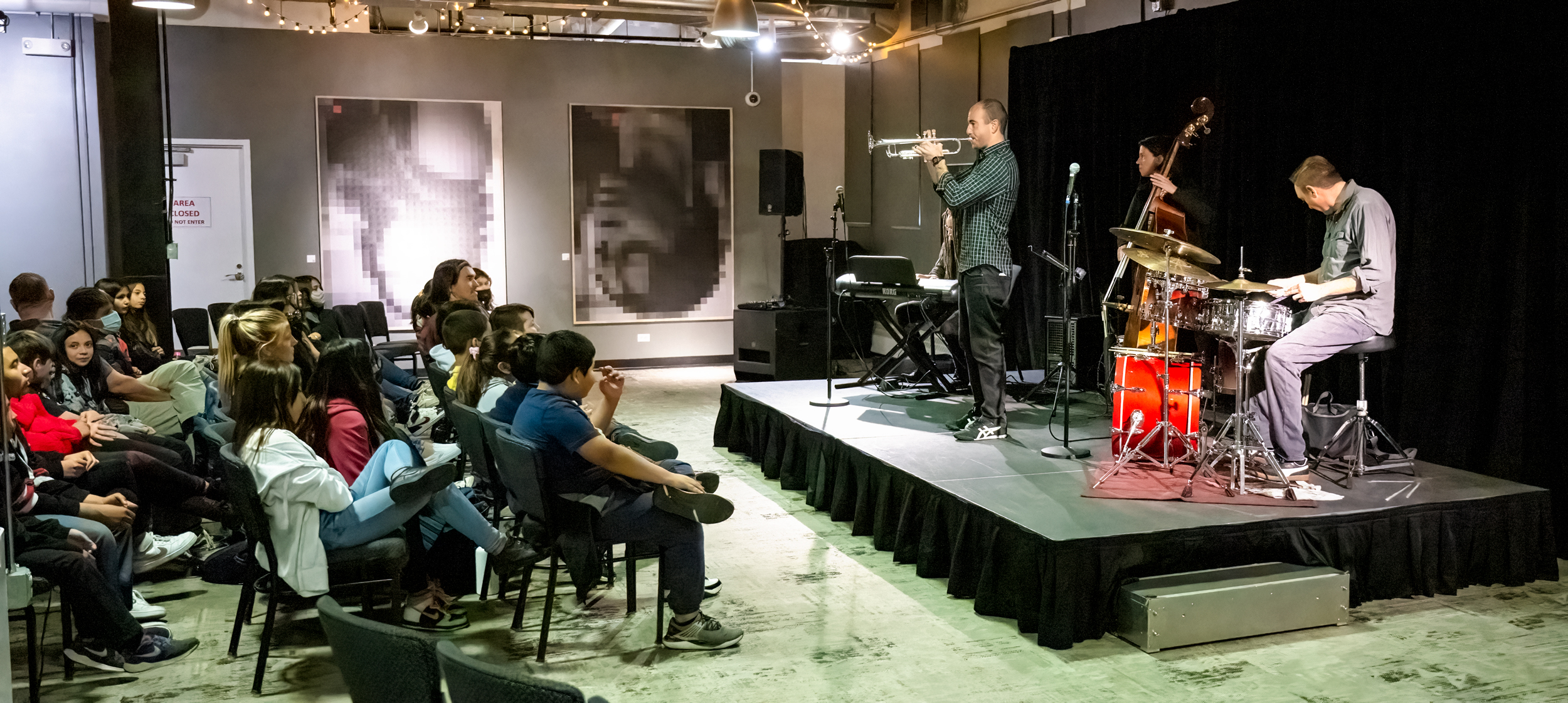 Gift of Jazz's Jazz for the Schools program, offered to student in Denver Public Schools at no cost. Students listen to live Jazz in the McNichols Building in downtown Denver.